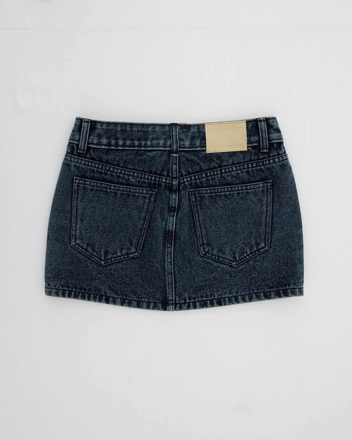 NOT FOR EVERYONE x PICCORO - Eyelet denim mini skirt