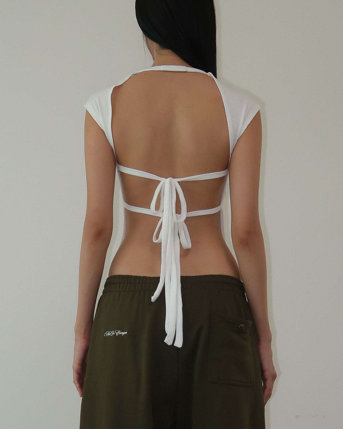 NOT FOR EVERYONE - Open back knit top