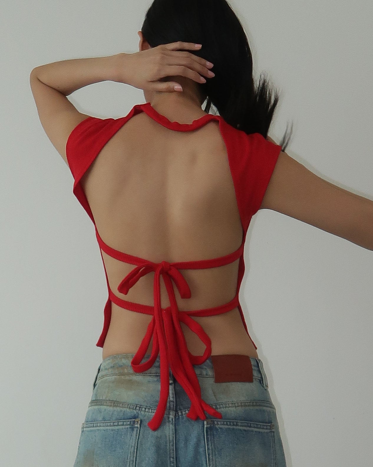 NOT FOR EVERYONE - Open back knit top