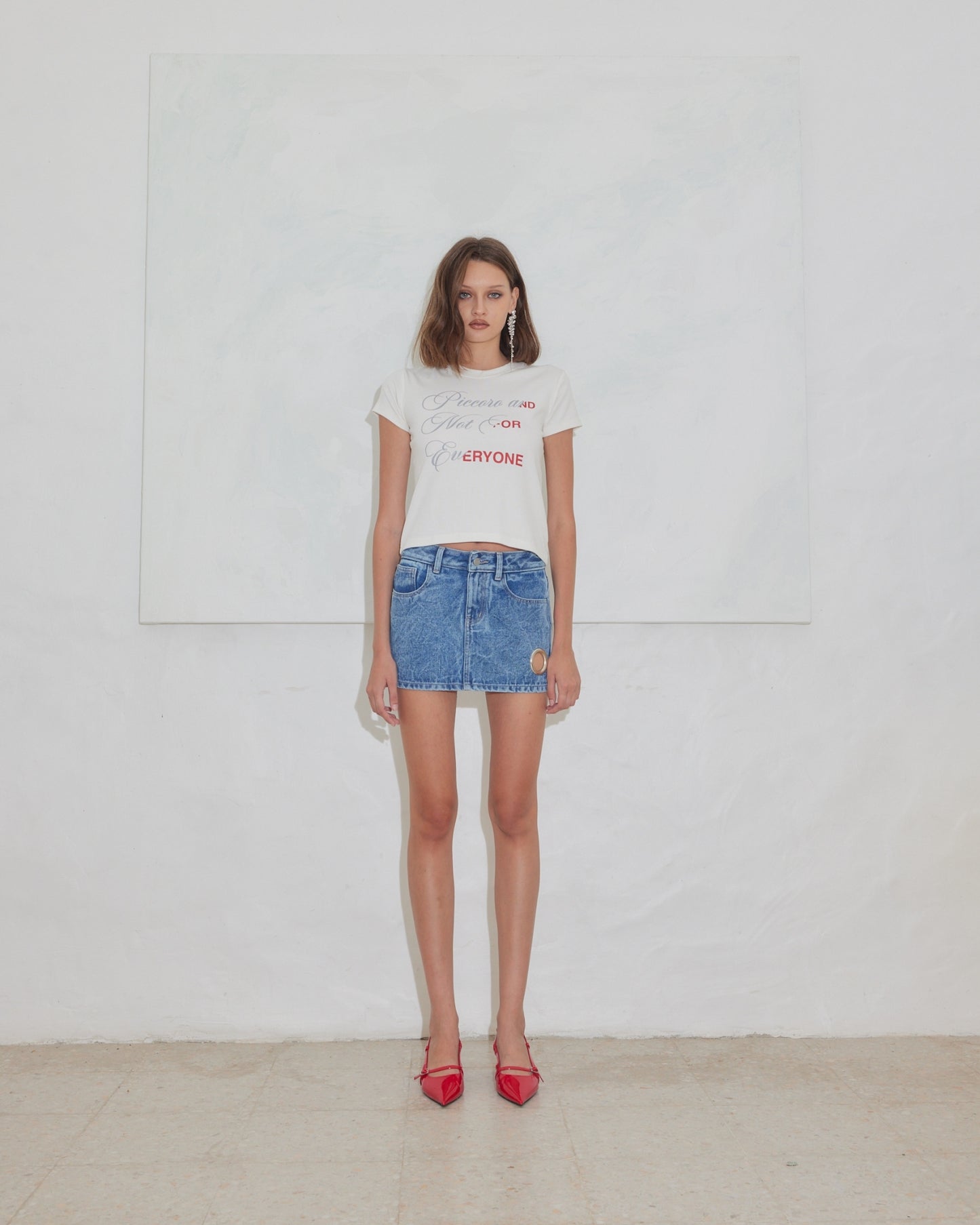 NOT FOR EVERYONE x PICCORO - Eyelet denim mini skirt