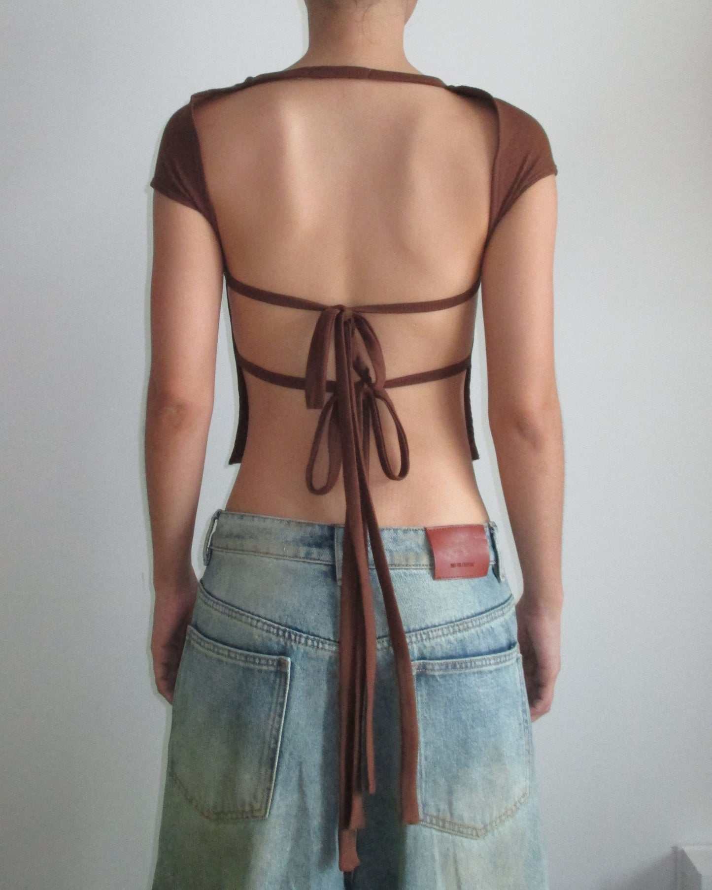 NOT FOR EVERYONE - Open back knit top