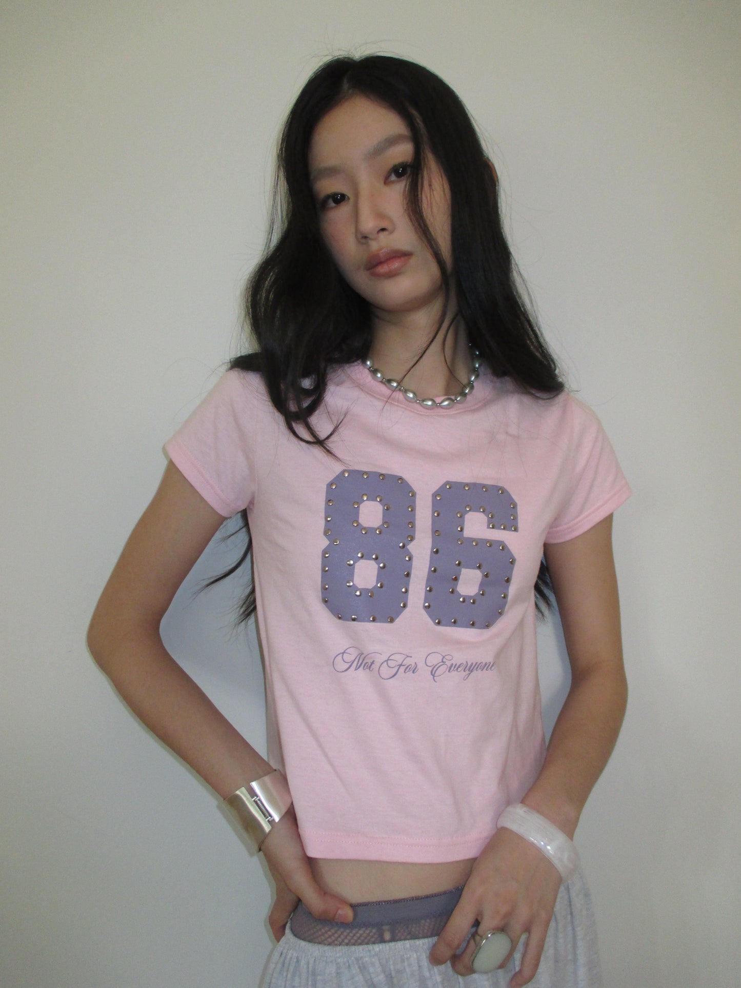 Not for everyone - 86 studded baby tee